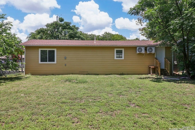937 Anderson, Seguin, TX 78155 - rear view of house with a yard and entry steps