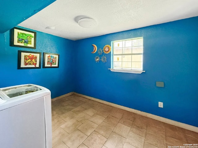 261 Shelburn, San Antonio, TX 78220 - washroom with washer / clothes dryer and a textured ceiling