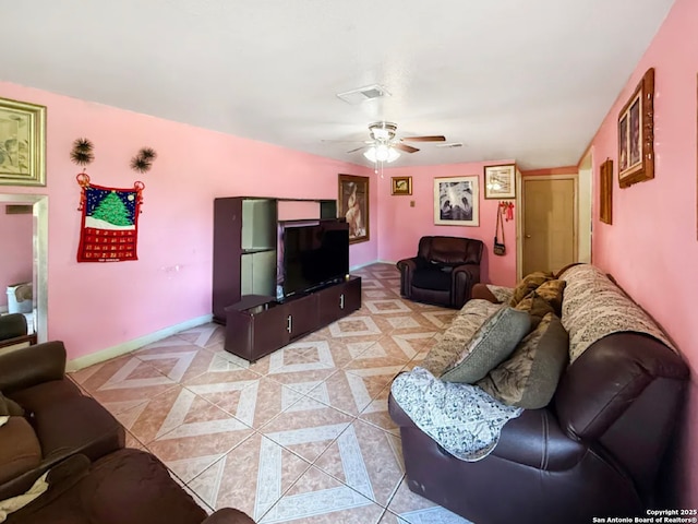 261 Shelburn, San Antonio, TX 78220 - living room featuring a ceiling fan and light tile patterned floors