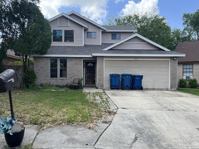 5212 Vinecrest, Kirby, TX 78219 - traditional-style home featuring brick siding, a garage, driveway, and a shingled roof