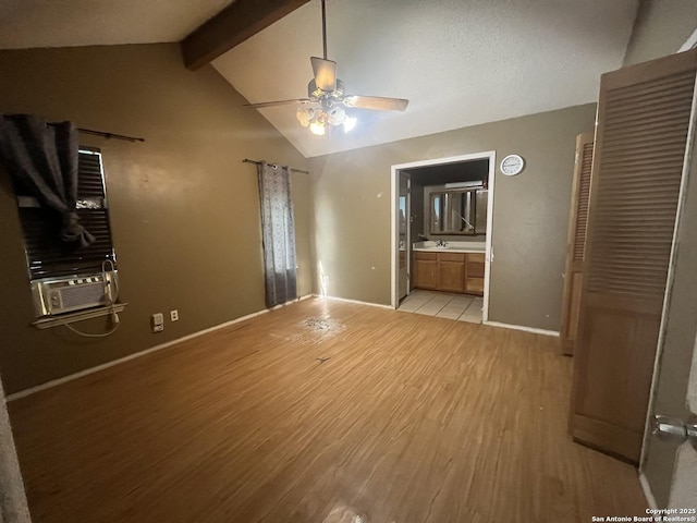 5212 Vinecrest, Kirby, TX 78219 - unfurnished bedroom featuring light wood finished floors, cooling unit, ensuite bathroom, and a ceiling fan