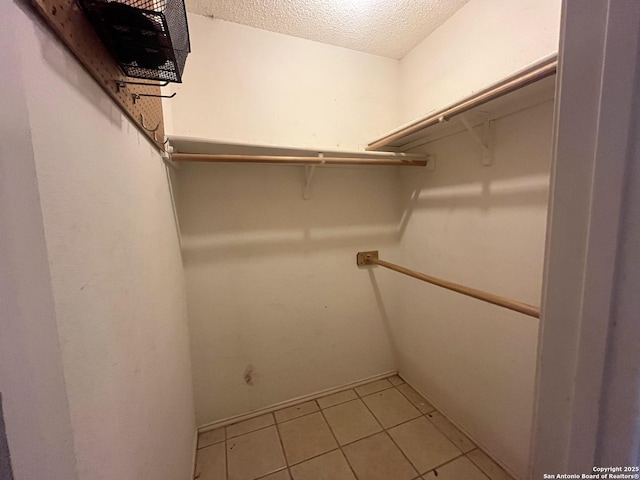 5212 Vinecrest, Kirby, TX 78219 - spacious closet featuring light tile patterned floors