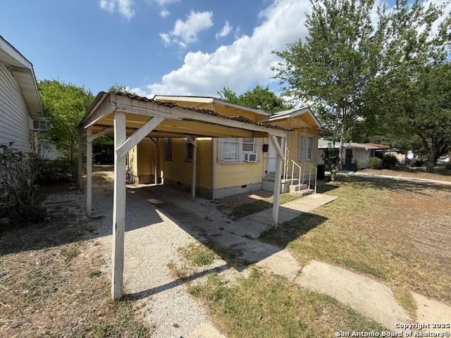 207 Fargo, San Antonio, TX 78220 - view of front of home featuring crawl space and a carport