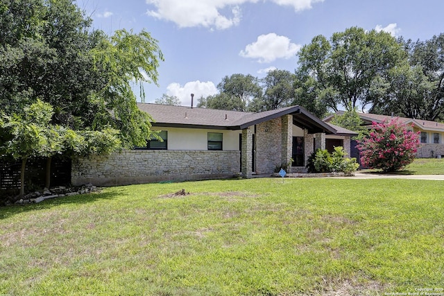 5738 Brenda Ln, San Antonio, TX 78240 - view of front of home with stone siding, a front lawn, and stucco siding