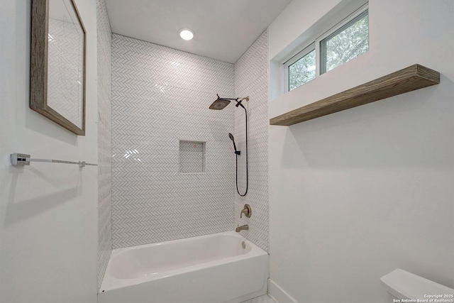 5738 Brenda Ln, San Antonio, TX 78240 - bathroom featuring toilet and washtub / shower combination