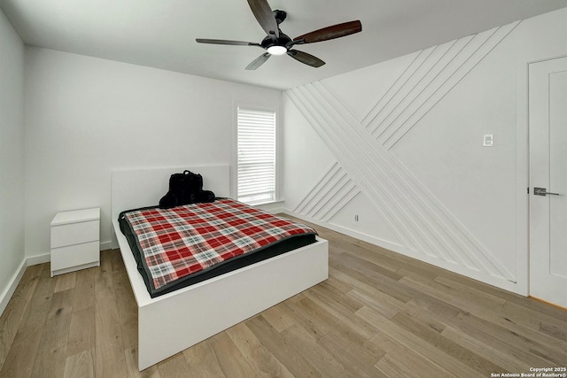 5738 Brenda Ln, San Antonio, TX 78240 - bedroom featuring light wood-style flooring, a ceiling fan, and vaulted ceiling
