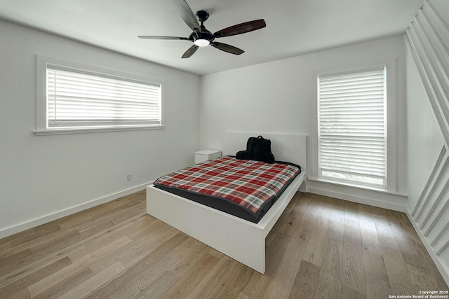 5738 Brenda Ln, San Antonio, TX 78240 - bedroom with wood finished floors and ceiling fan