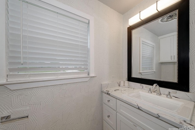 5738 Brenda Ln, San Antonio, TX 78240 - bathroom with wallpapered walls and vanity