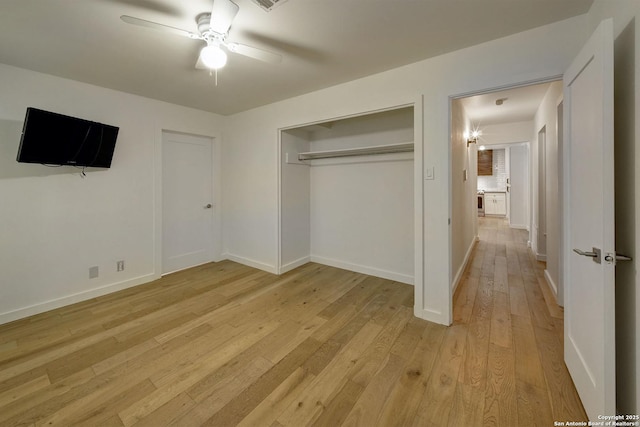 5738 Brenda Ln, San Antonio, TX 78240 - unfurnished bedroom featuring light wood finished floors, a closet, and ceiling fan