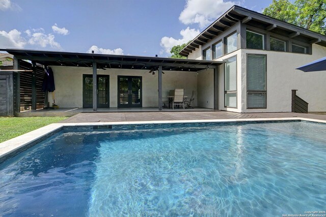 5738 Brenda Ln, San Antonio, TX 78240 - outdoor pool with french doors and a patio area