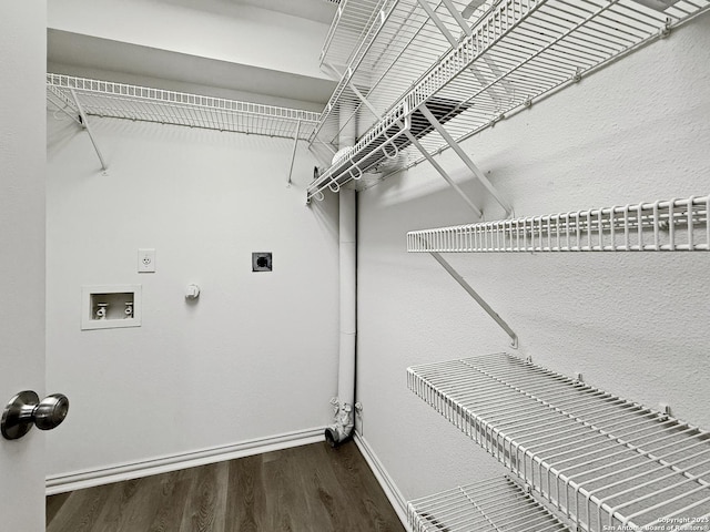 1222 Bobcat Pass, San Antonio, TX 78251 - laundry area featuring hookup for an electric dryer, wood finished floors, washer hookup, and gas dryer hookup