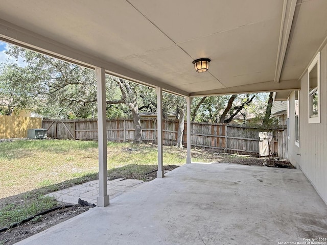1222 Bobcat Pass, San Antonio, TX 78251 - fenced backyard featuring a patio area and a carport