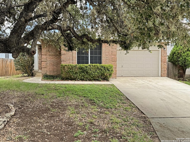 1222 Bobcat Pass, San Antonio, TX 78251 - view of property hidden behind natural elements with brick siding, driveway, and an attached garage