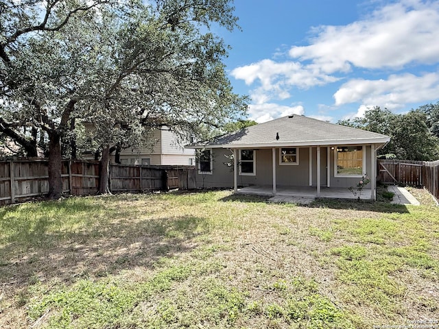 1222 Bobcat Pass, San Antonio, TX 78251 - back of property with a fenced backyard and a patio area