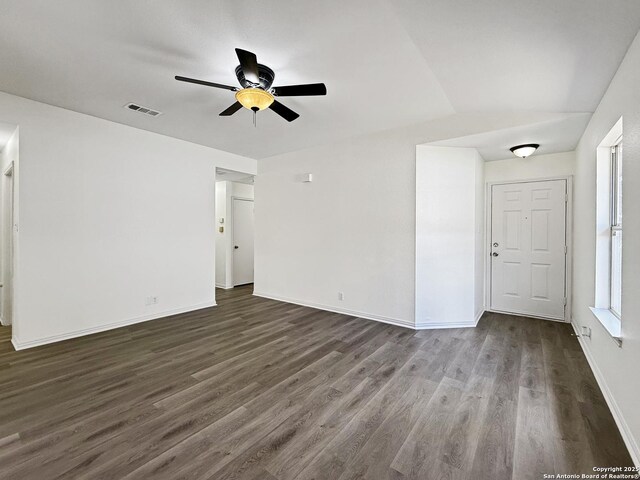 1222 Bobcat Pass, San Antonio, TX 78251 - empty room with dark wood-style floors and ceiling fan