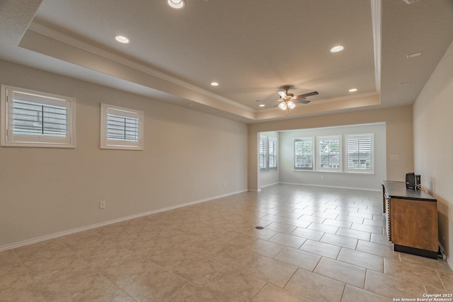 13119 Sulphur Trl, San Antonio, TX 78253 - empty room featuring a raised ceiling, ceiling fan, recessed lighting, crown molding, and light tile patterned floors