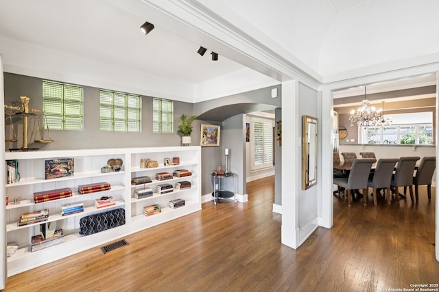 133 E Mistletoe Ave, San Antonio, TX 78212 - interior space with arched walkways, a chandelier, and wood finished floors