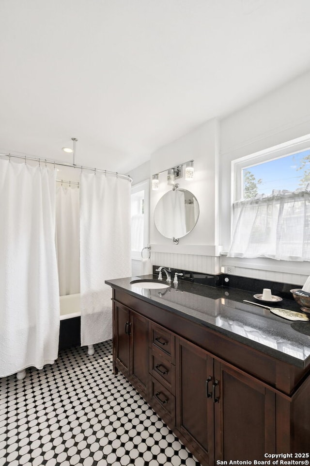133 E Mistletoe Ave, San Antonio, TX 78212 - full bath featuring vanity and shower / tub combo with curtain