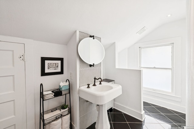 133 E Mistletoe Ave, San Antonio, TX 78212 - bathroom featuring lofted ceiling and tile patterned floors