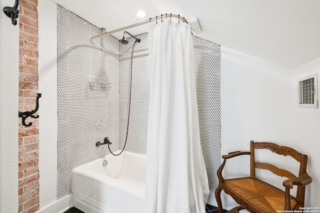 133 E Mistletoe Ave, San Antonio, TX 78212 - bathroom featuring shower / bath combo with shower curtain and baseboards