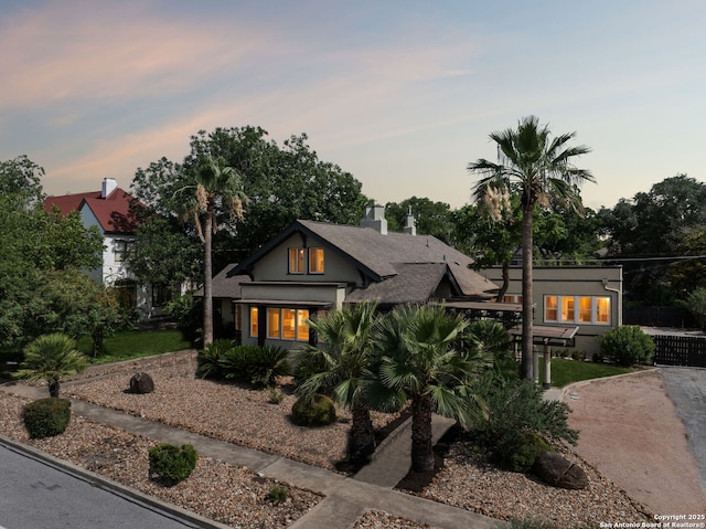 133 E Mistletoe Ave, San Antonio, TX 78212 - view of front facade with a chimney and roof with shingles