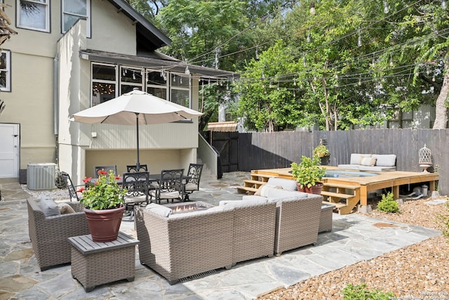 133 E Mistletoe Ave, San Antonio, TX 78212 - fenced backyard with an outdoor living space, a patio, and outdoor dining space