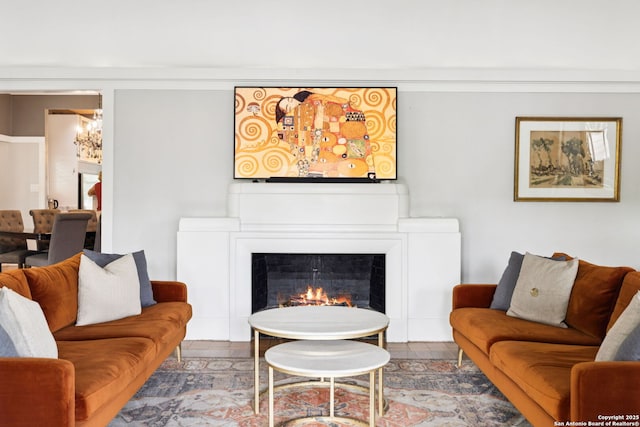 133 E Mistletoe Ave, San Antonio, TX 78212 - living area with a warm lit fireplace