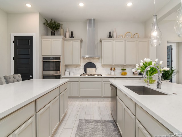 25022 Dulzura, San Antonio, TX 78261 - kitchen featuring wall chimney exhaust hood, appliances with stainless steel finishes, backsplash, light countertops, and recessed lighting