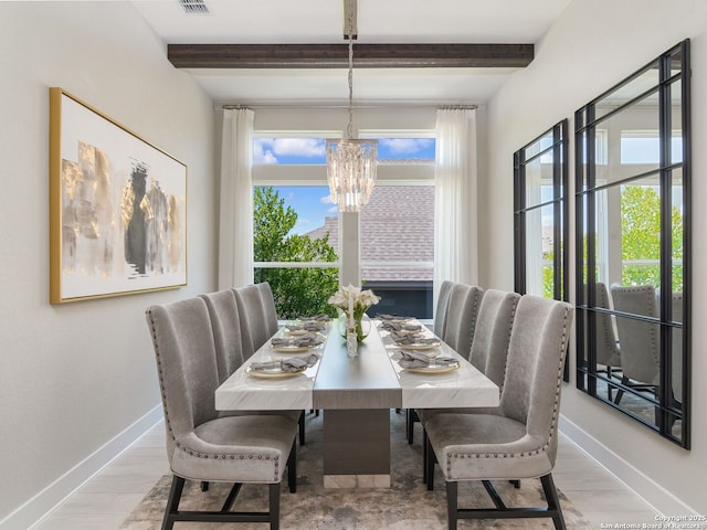 25022 Dulzura, San Antonio, TX 78261 - dining room with a chandelier, beam ceiling, and light wood finished floors