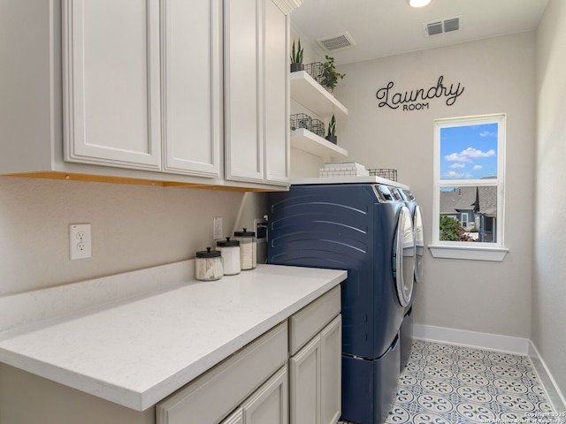 25022 Dulzura, San Antonio, TX 78261 - laundry area featuring washing machine and dryer and cabinet space