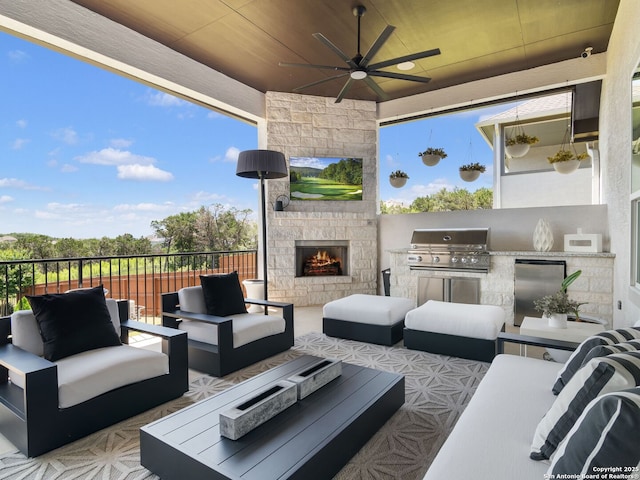 25022 Dulzura, San Antonio, TX 78261 - view of patio with area for grilling, ceiling fan, and an outdoor living space with a fireplace