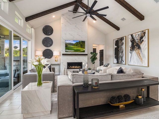 25022 Dulzura, San Antonio, TX 78261 - living room with high vaulted ceiling, beam ceiling, a ceiling fan, a high end fireplace, and recessed lighting