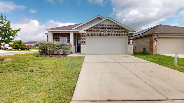 2076 Meadow Pipit, New Braunfels, TX 78130 - single story home with an attached garage, a front lawn, brick siding, board and batten siding, and concrete driveway