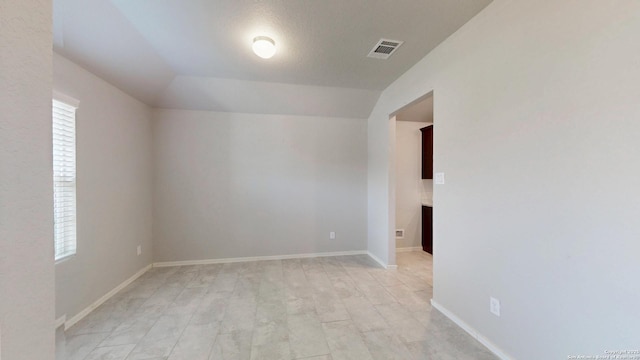2076 Meadow Pipit, New Braunfels, TX 78130 - unfurnished room featuring lofted ceiling