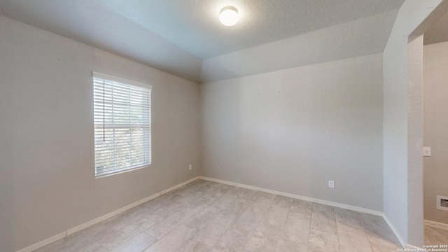2076 Meadow Pipit, New Braunfels, TX 78130 - unfurnished room featuring lofted ceiling and baseboards