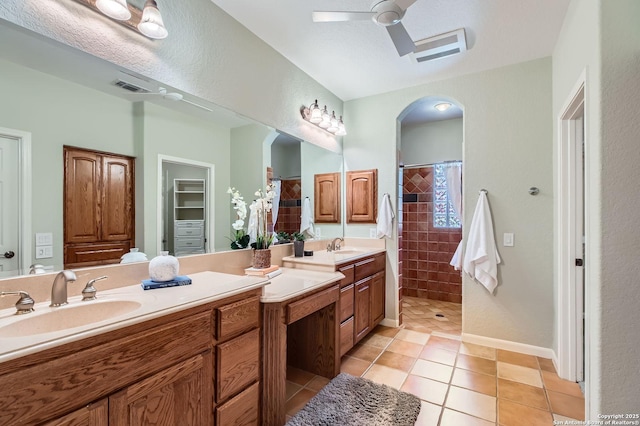34 Roseheart, San Antonio, TX 78259 - full bathroom with tiled shower, vanity, tile patterned floors, and a ceiling fan