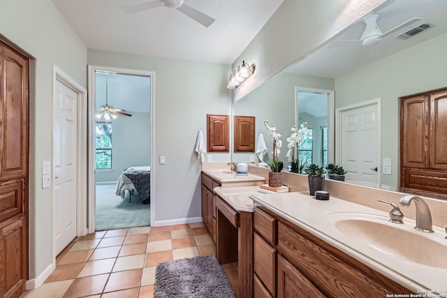 34 Roseheart, San Antonio, TX 78259 - full bathroom with a ceiling fan, double vanity, ensuite bath, and tile patterned floors