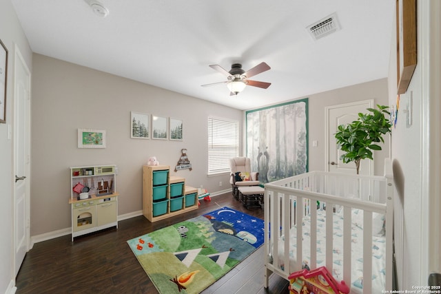 3118 Limestone, San Antonio, TX 78253 - bedroom with dark wood finished floors, a crib, and ceiling fan