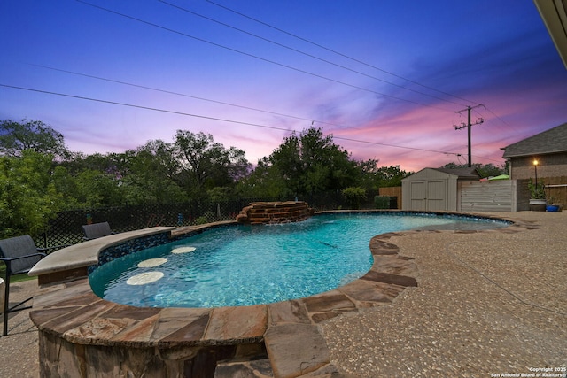 3118 Limestone, San Antonio, TX 78253 - pool at dusk featuring a storage unit and a fenced backyard