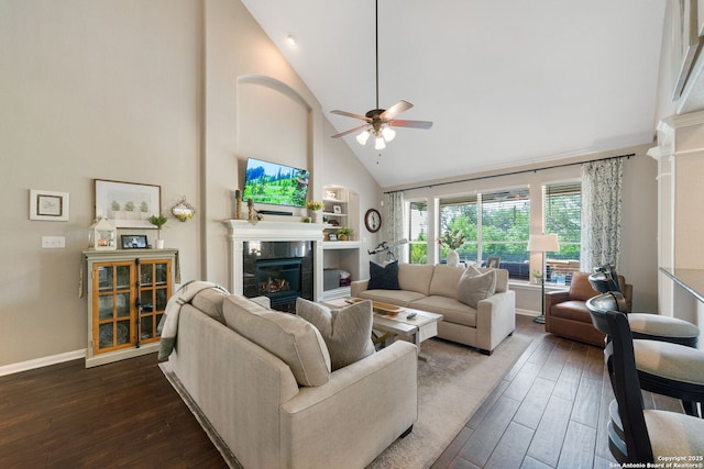 3118 Limestone, San Antonio, TX 78253 - living area with high vaulted ceiling, a fireplace, ceiling fan, dark wood-style flooring, and built in shelves