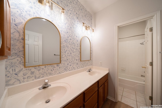 16914 Redhorse Pass, San Antonio, TX 78247 - bathroom featuring wallpapered walls, double vanity, and  shower combination