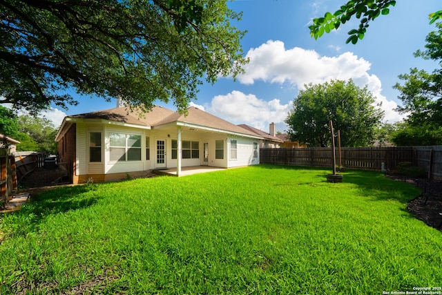 16914 Redhorse Pass, San Antonio, TX 78247 - rear view of house with a patio and a fenced backyard