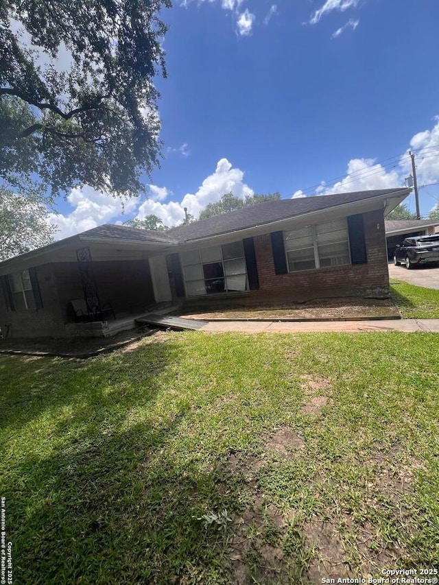 4849 Briarbend, Houston, TX 77035 - ranch-style home featuring brick siding and a front lawn