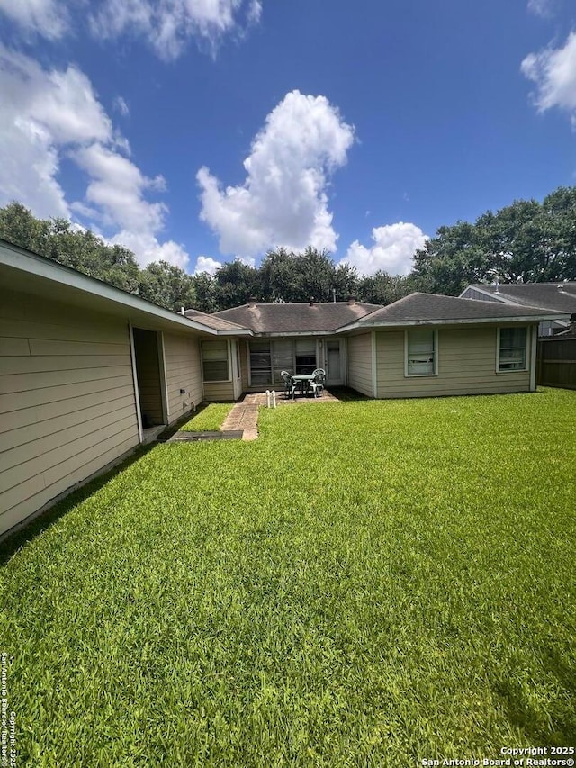 4849 Briarbend, Houston, TX 77035 - rear view of house featuring a yard and a patio