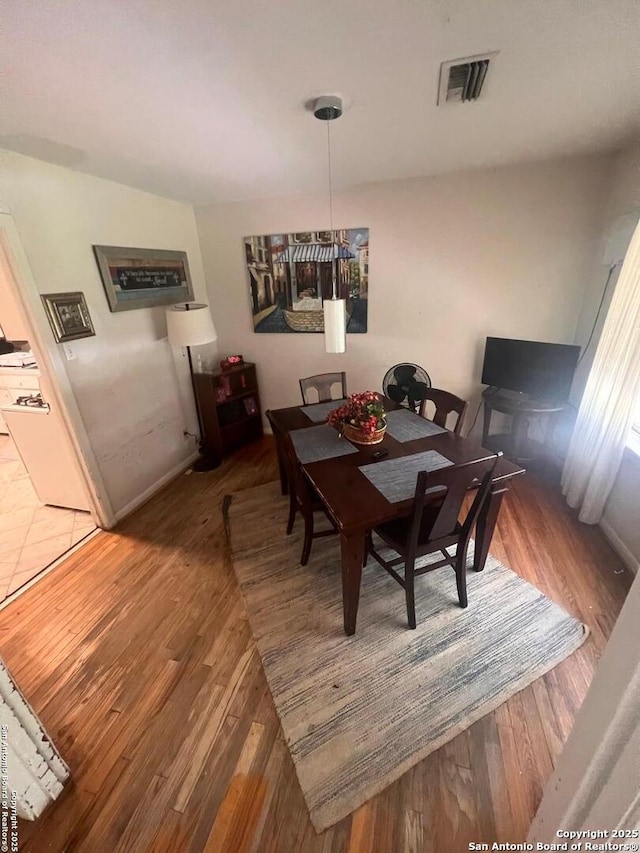 4849 Briarbend, Houston, TX 77035 - dining space featuring wood finished floors