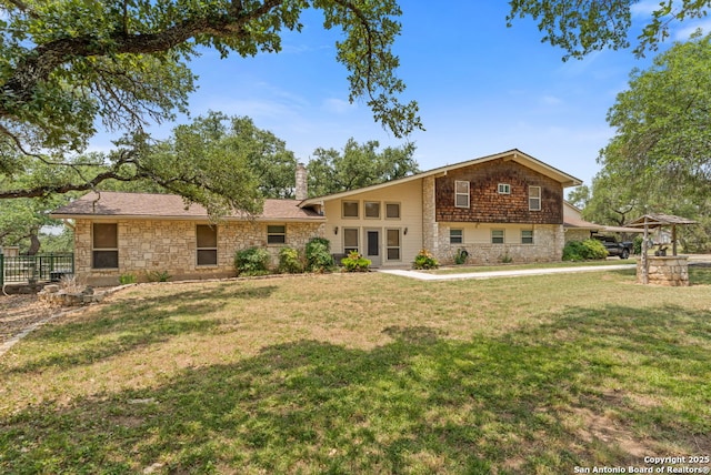 33171 Blanco Rd, Bulverde, TX 78163 - view of front of home with stone siding and a chimney