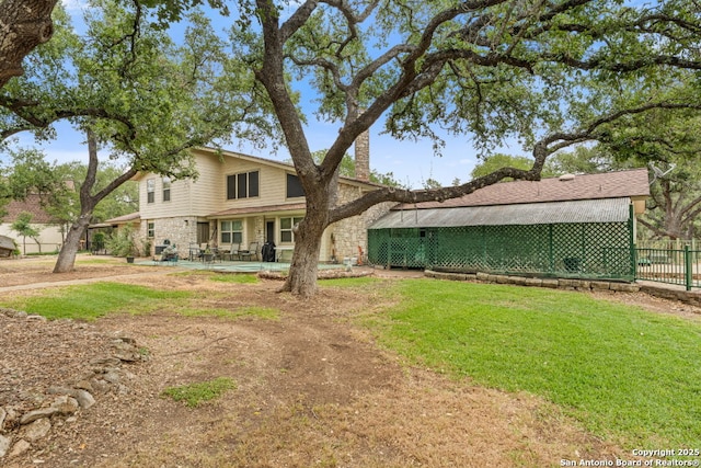 33171 Blanco Rd, Bulverde, TX 78163 - back of property featuring stone siding