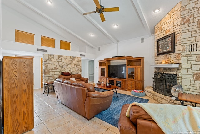 33171 Blanco Rd, Bulverde, TX 78163 - living room featuring ceiling fan, a fireplace, light tile patterned floors, beam ceiling, and high vaulted ceiling