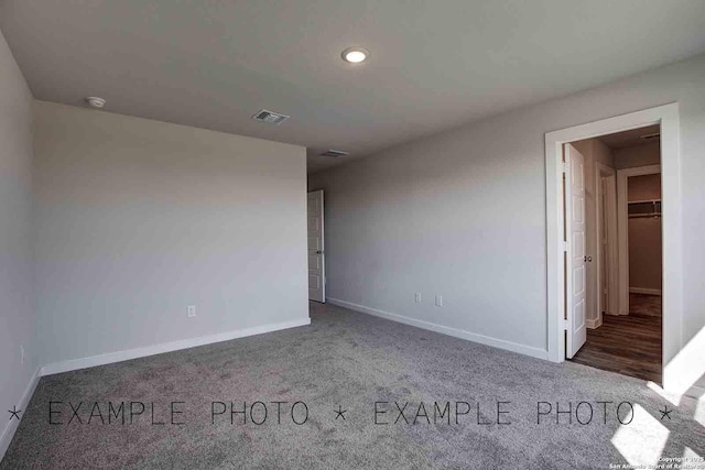 9974 Forestier Grn, San Antonio, TX 78221 - unfurnished room with carpet floors, recessed lighting, and a smoke detector