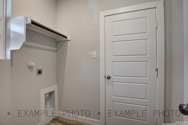 4311 Clarisse St, New Braunfels, TX 78130 - washroom featuring hookup for an electric dryer and wood finished floors
